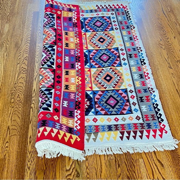 AUTHENTIC TURKISH KILIMS. REVERSIBLE AND IMPORTED FROM EUROPE.